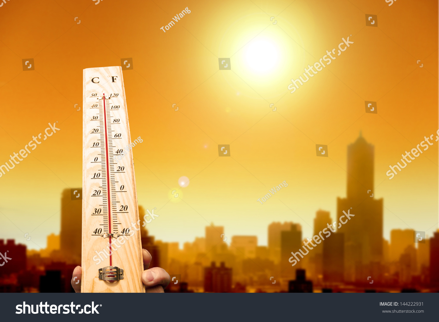 heat wave in the city and hand showing thermometer for high temperature #144222931