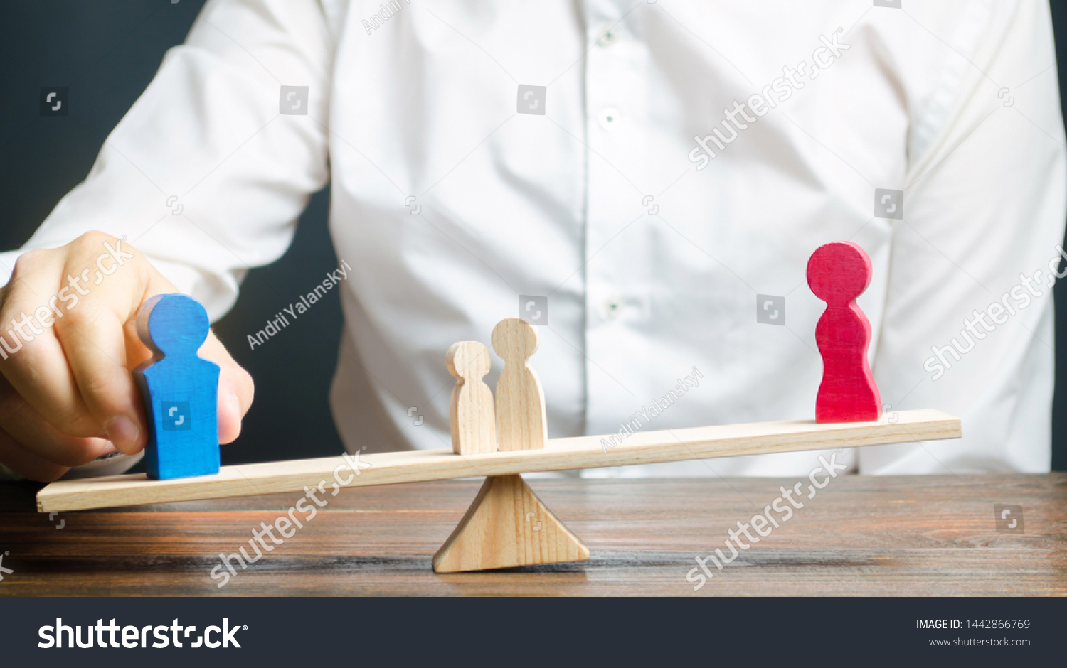 Wooden figures of people on scales. The court decision on custody of the children by one of the parents after the divorce. Deprivation of parental rights. Guardianship concept. Guardian #1442866769