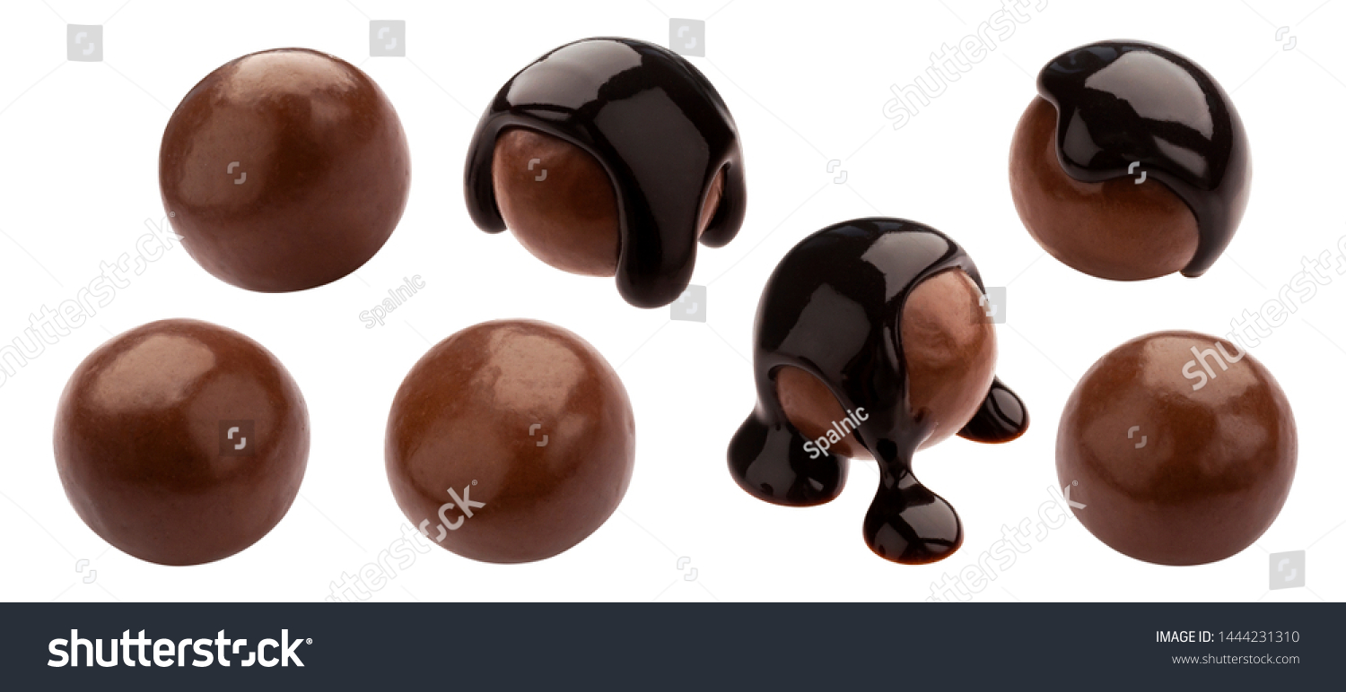 Homemade cocoa balls, dragee with melted chocolate. Whole isolated candies set. Luxury sweets with shiny brown icing on white background. Tasty gourmet confectionery collection #1444231310