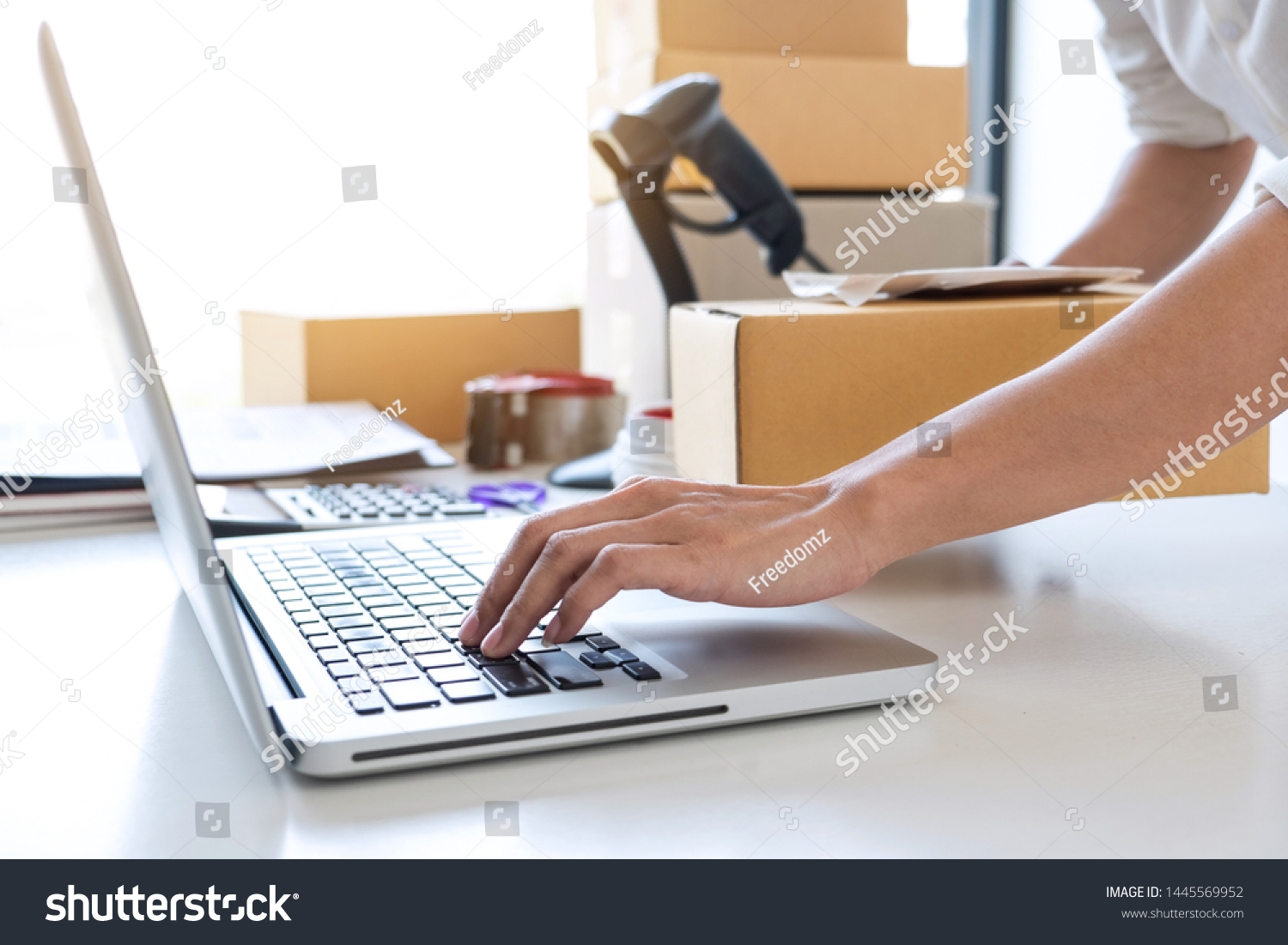 Shipment Online Sales, Small business or SME entrepreneur owner delivery service and working packing box, business owner working checking order to confirm before sending customer in post office. #1445569952