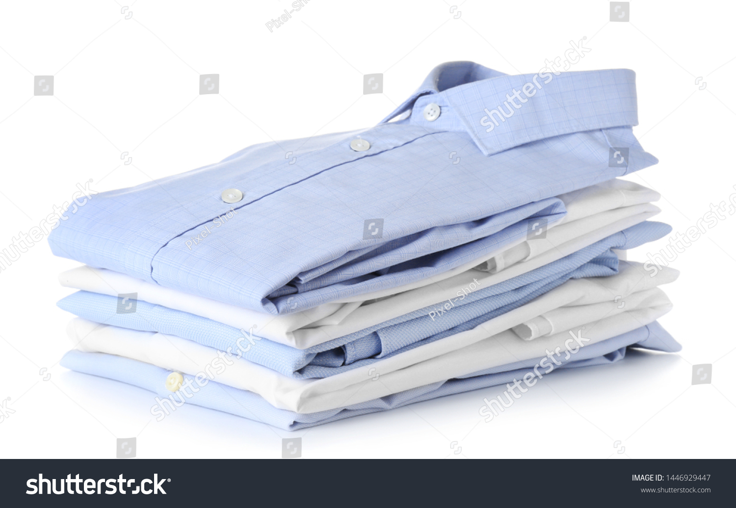 Stack of clean clothes on white background #1446929447