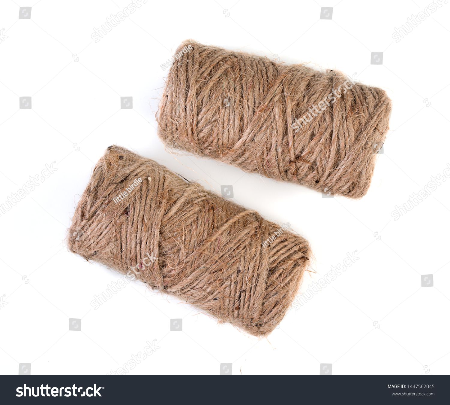 Pair of spools of natural linen twine, isolated on white background, top view. #1447562045