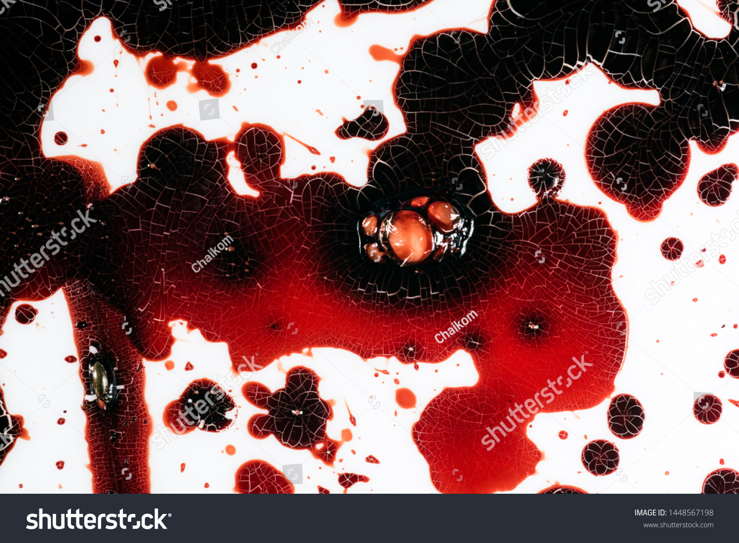 Realistic bloody splatters. Drop and blob of blood. Bloodstains. #1448567198