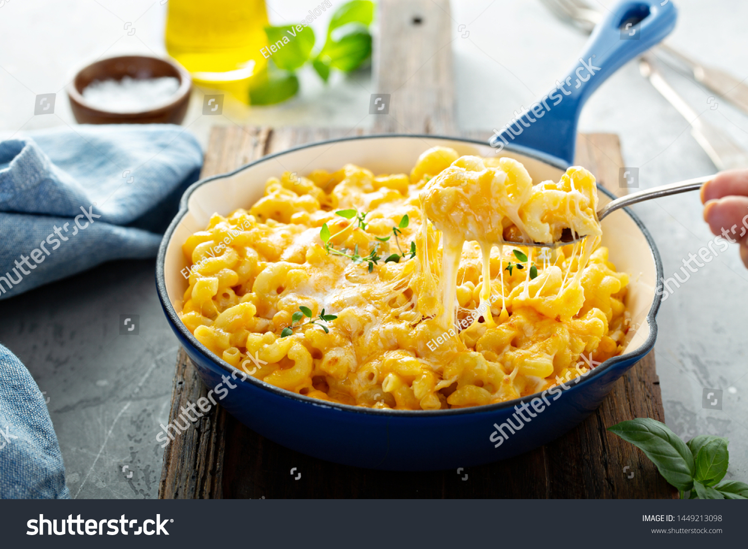 Baked mac and cheese in a cast iron pan #1449213098