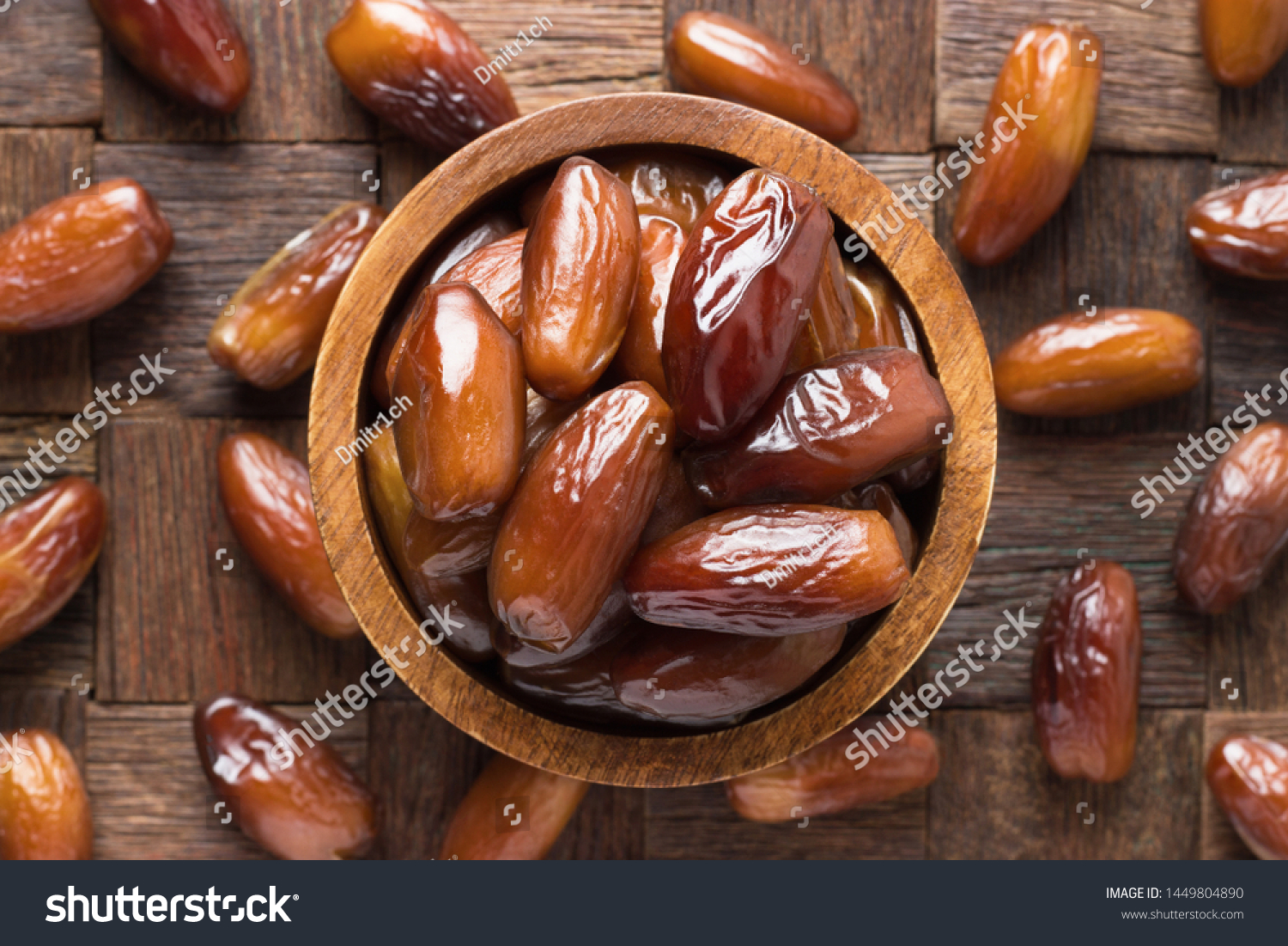 dried date fruit in bowl on wooden table background. #1449804890