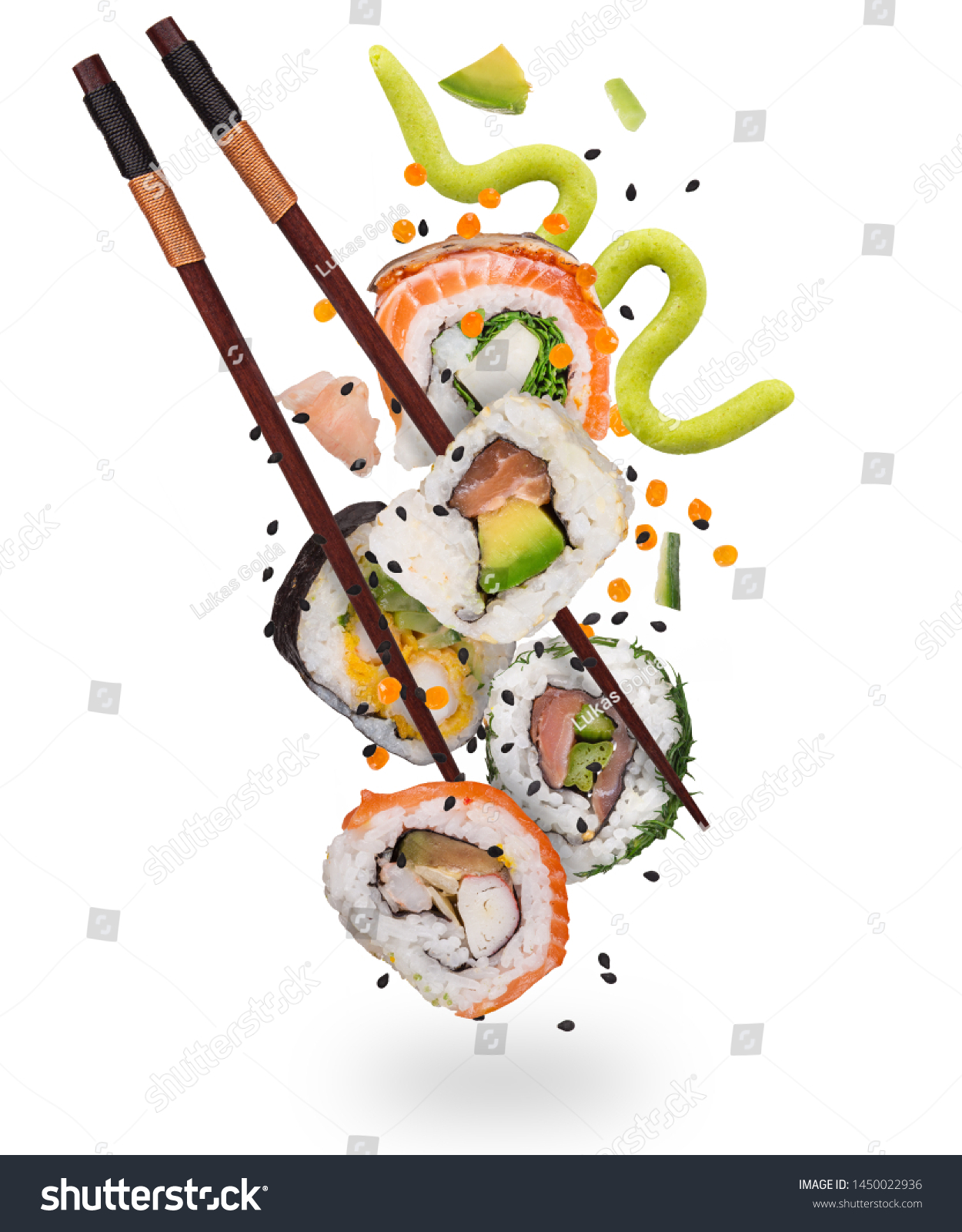 Pieces of delicious japanese sushi frozen in the air. Isolated on white background #1450022936