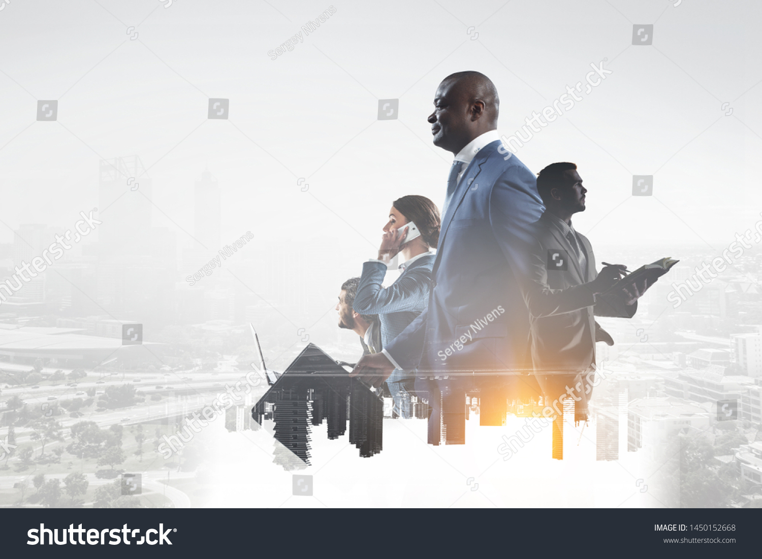 Happy black businessman with other people working in office on cityscape background #1450152668