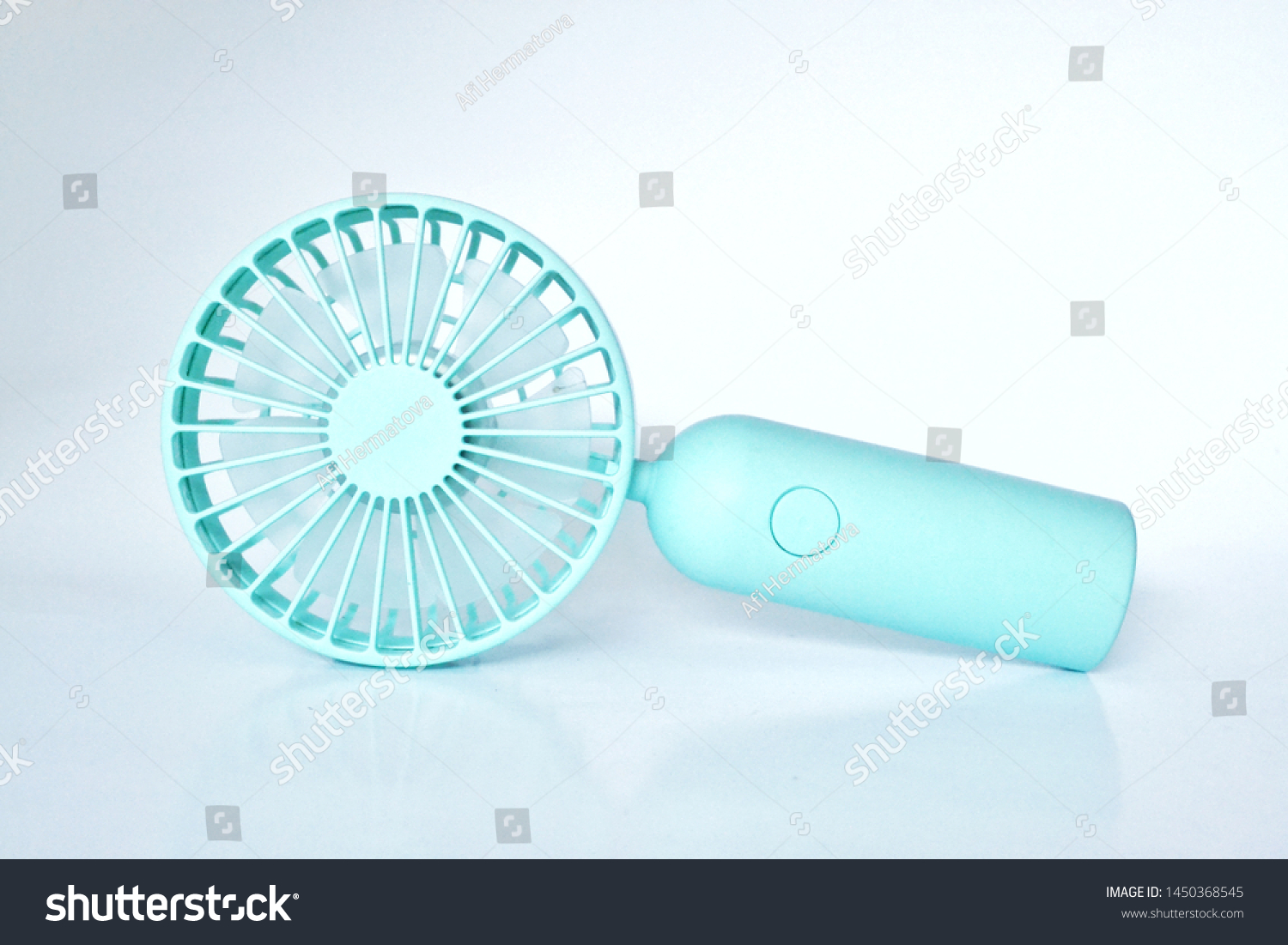 Portable rechargeable mini fans. Portable fans that can be easily carried everywhere. Close-up of tosca portable fans.  #1450368545