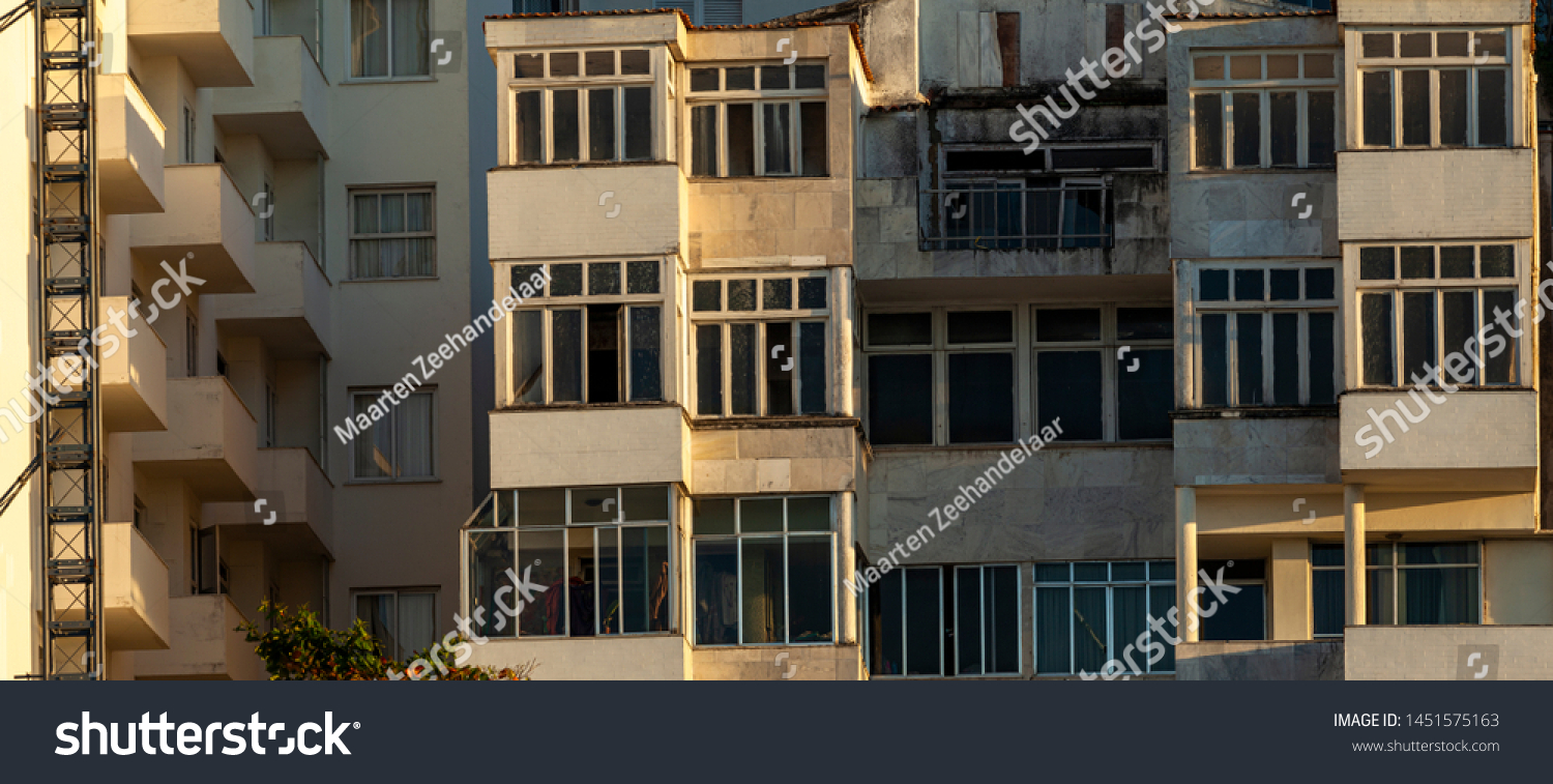 Panorama of architectural detail of facades of residential buildings at the Copacabana beach boulevard with weathered exteriors #1451575163