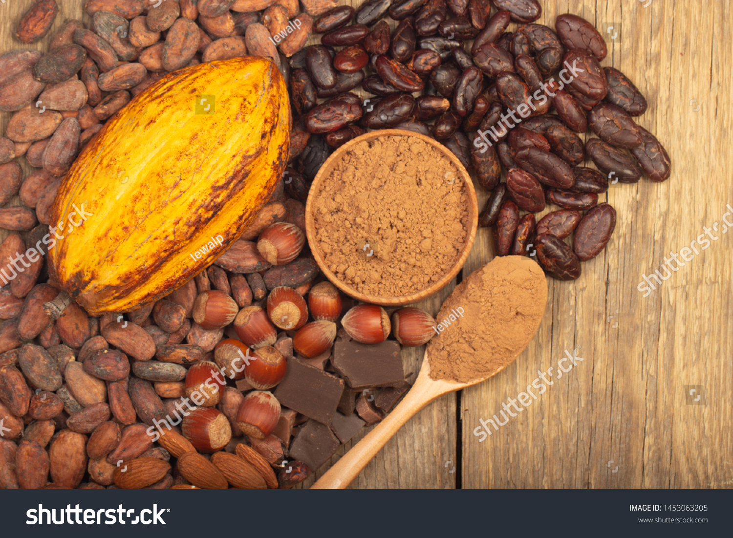cacao pods, carob pods and dried fruits on wooden background #1453063205