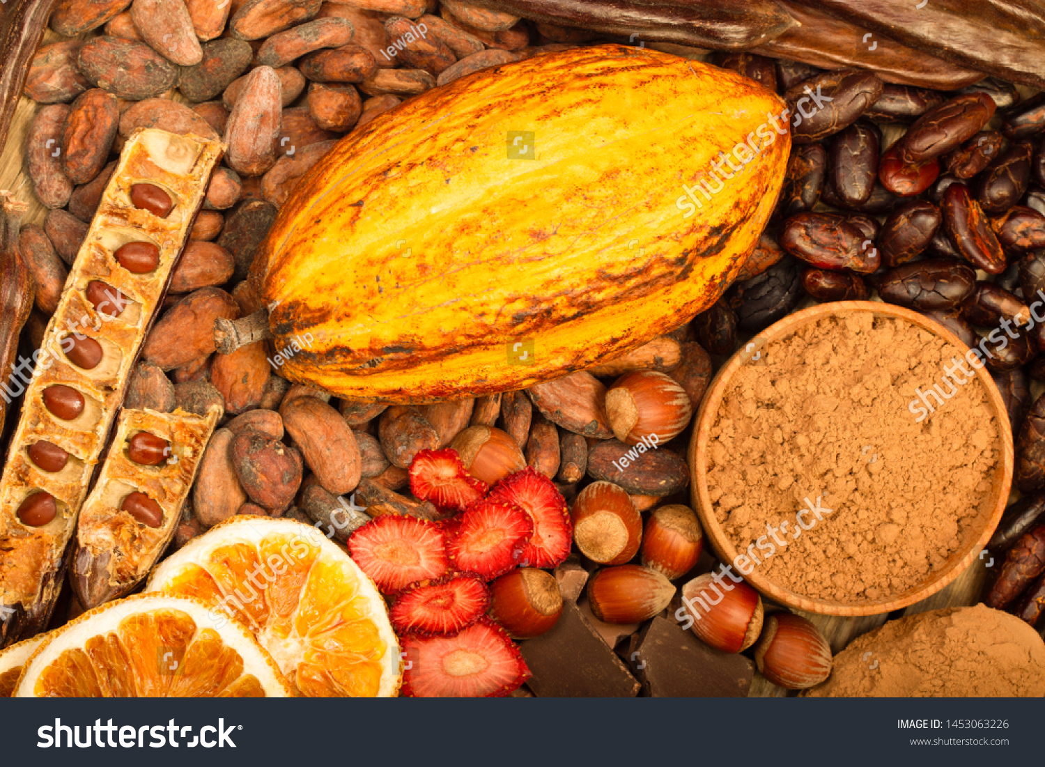 cacao pods, carob pods and dried fruits on wooden background #1453063226