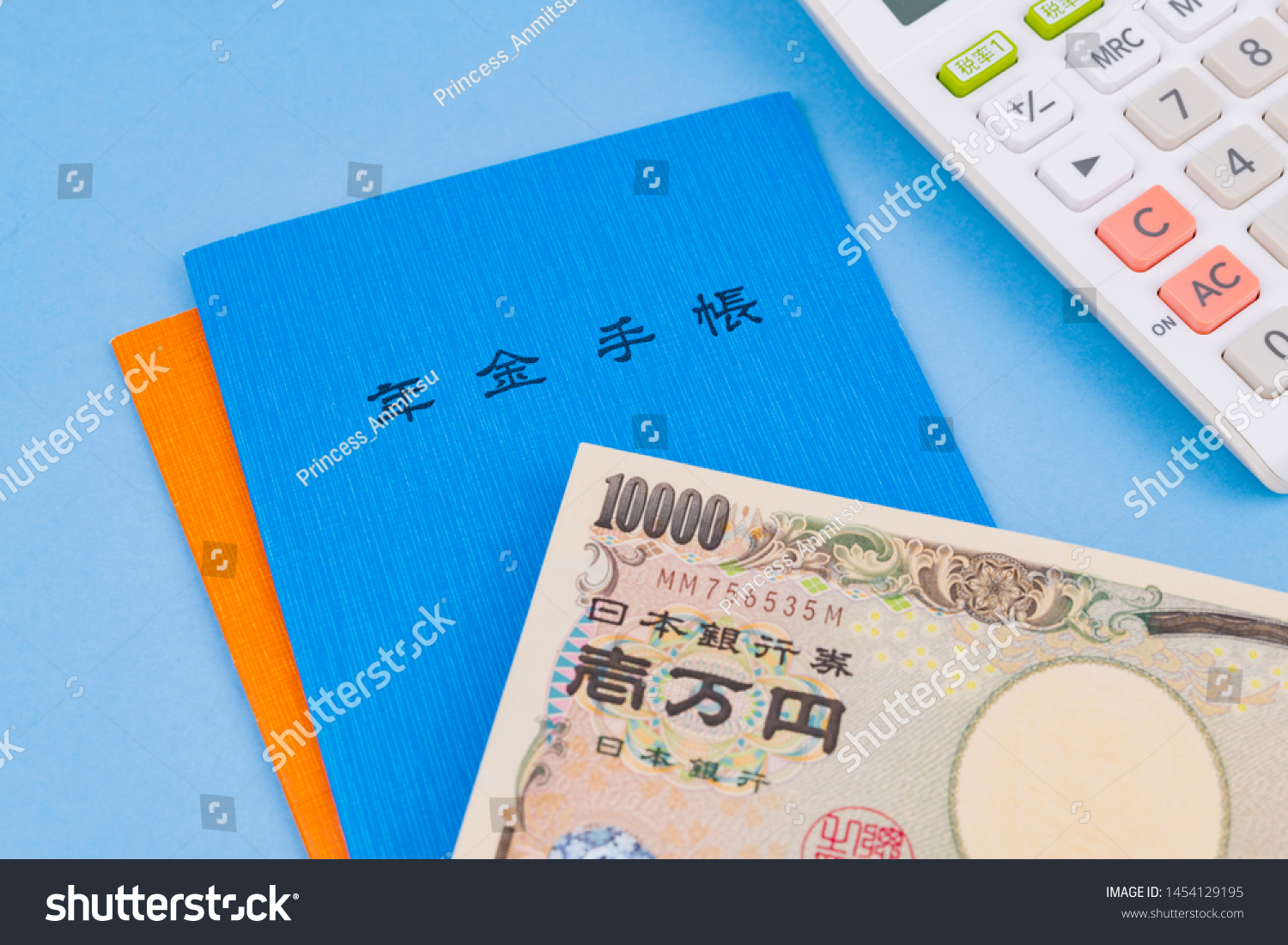 National Pension Handbook. Translation on notebook text: "Pension book" and "Social Insurance Agency". Translation on bill text: "Bank of Japan Tickets" "One hundred thousand yen" "The Bank of Japan". #1454129195