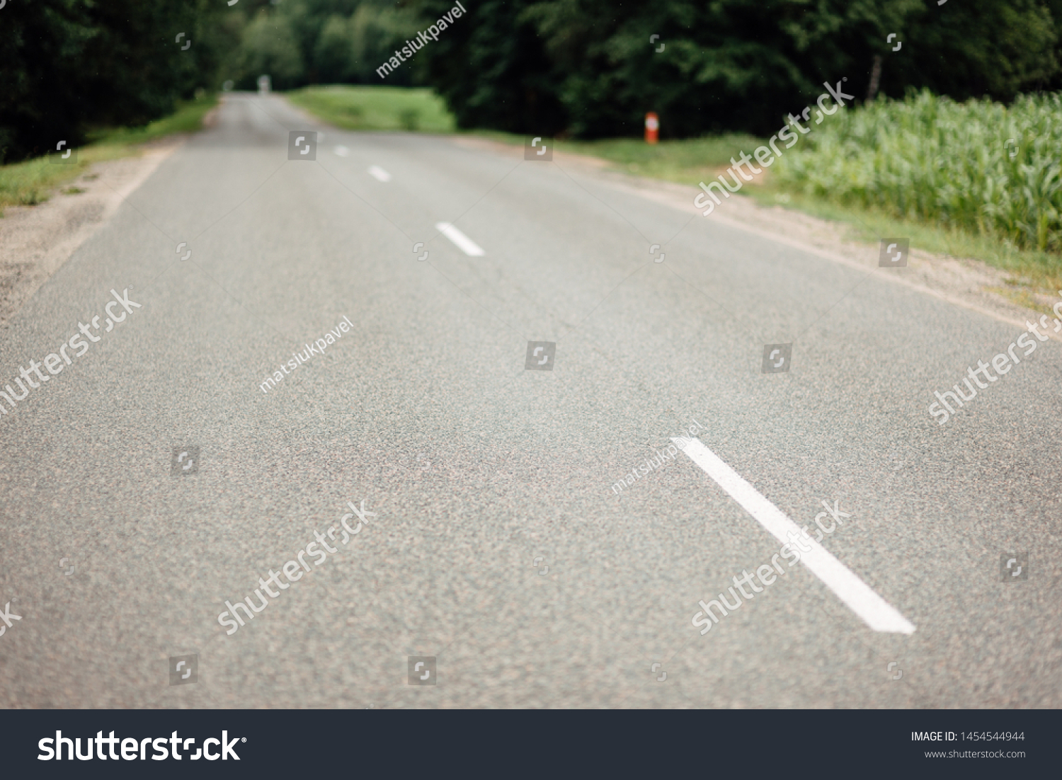 empty asphalt city road, defocusing road #1454544944