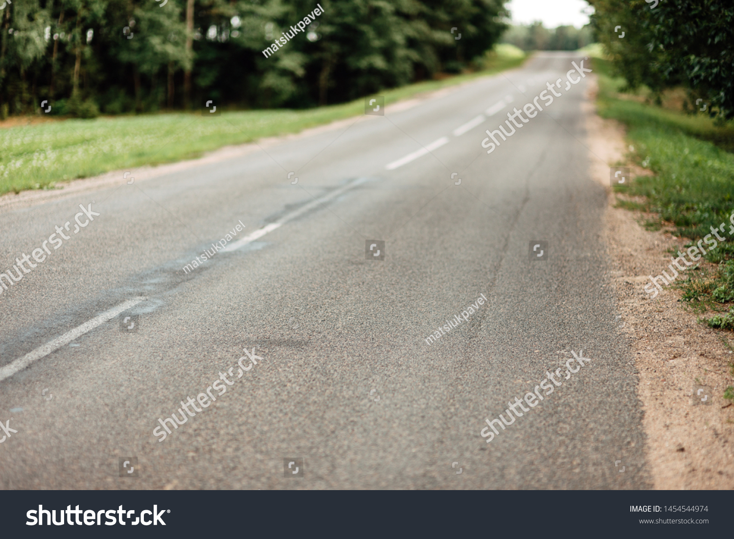 empty asphalt city road, defocusing road #1454544974