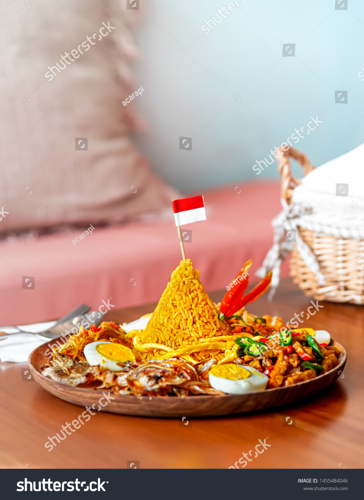 Cone Shaped Yellow Padang Rice Called Nasi Tumpeng with Indonesian National Flag on Top of For Independence Day Celebration at 17 August #1455484046