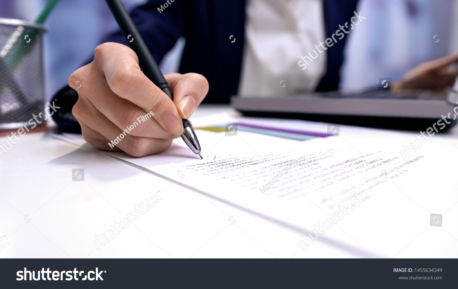 Female director signing document on office table, company agreement, business #1455634349