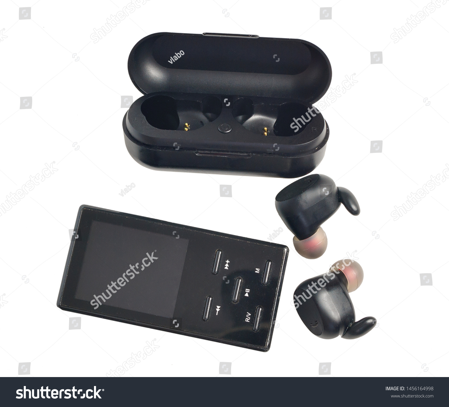 Wireless earphones.wireless headphones in the case of charging and mp3 pleer isolated on white background #1456164998
