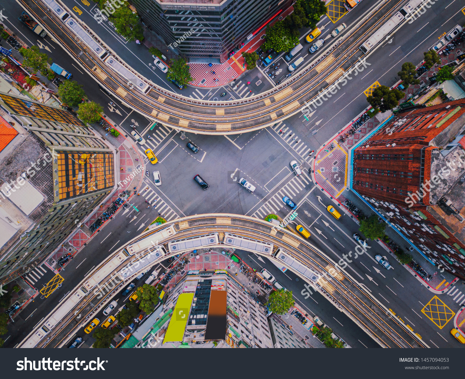 Aerial view of cars and trains with intersection or junction with traffic, Taipei Downtown, Taiwan. Financial district and business area. Smart urban city technology. #1457094053