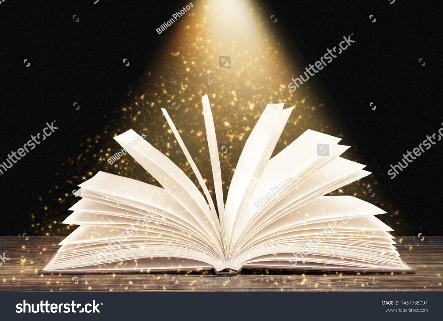 Image of opened magic book with magic lights #1457785997