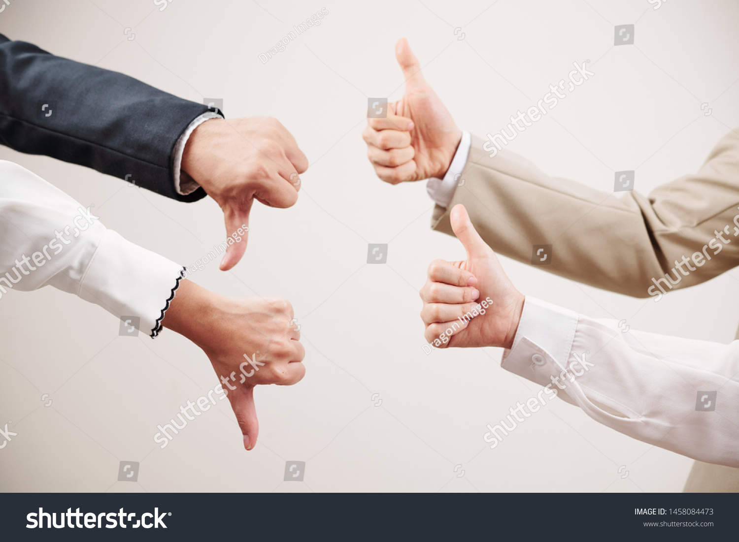 Group of two business partners showing thumb up and other two partners showing failure in business isolated on white background #1458084473