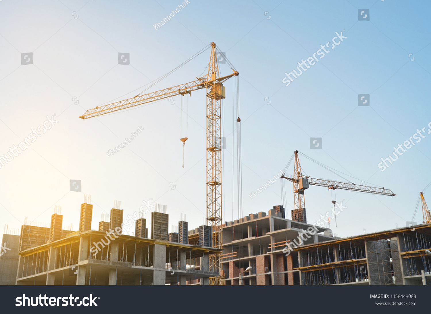 Construction crane on the background of the sky. Construction site. #1458448088