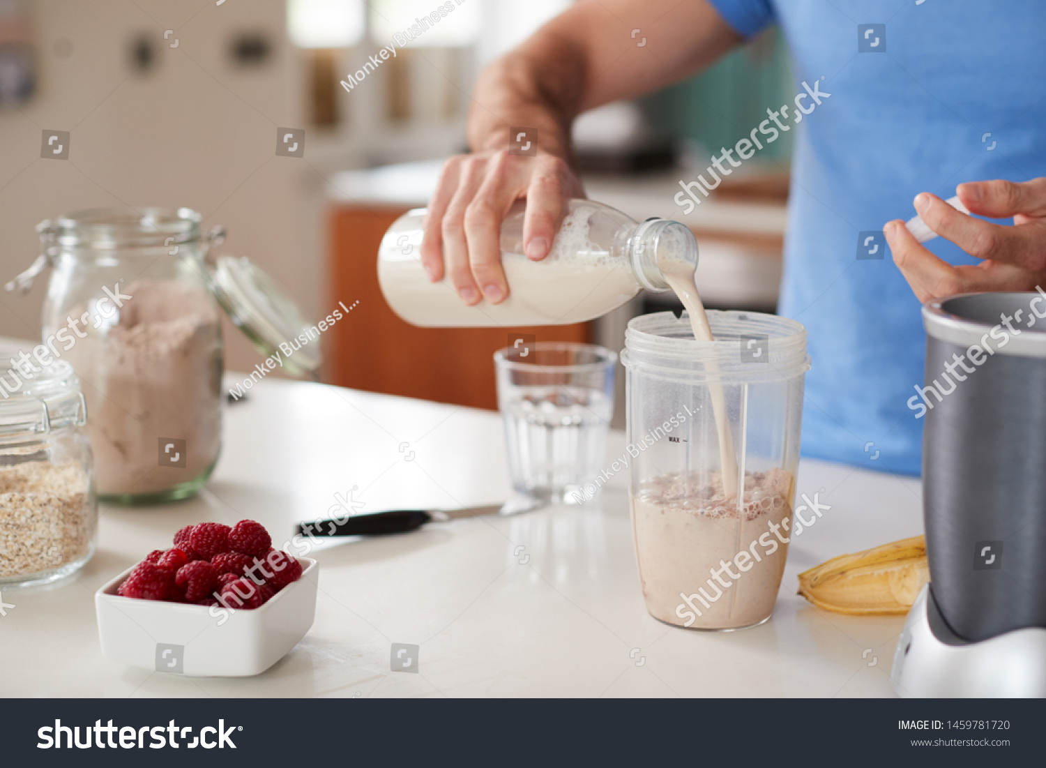 Close Up Of Man Making Protein Shake After Exercise At Home #1459781720