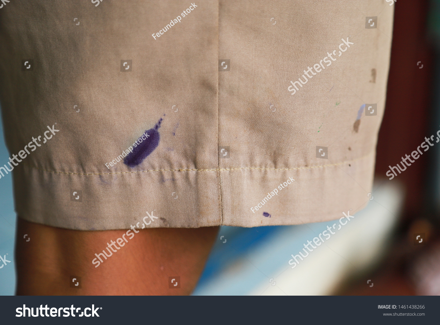 Dirty ink and mud stain on clothes from unexpected accident in daily life. dirt stains for cleaning and washing concept #1461438266