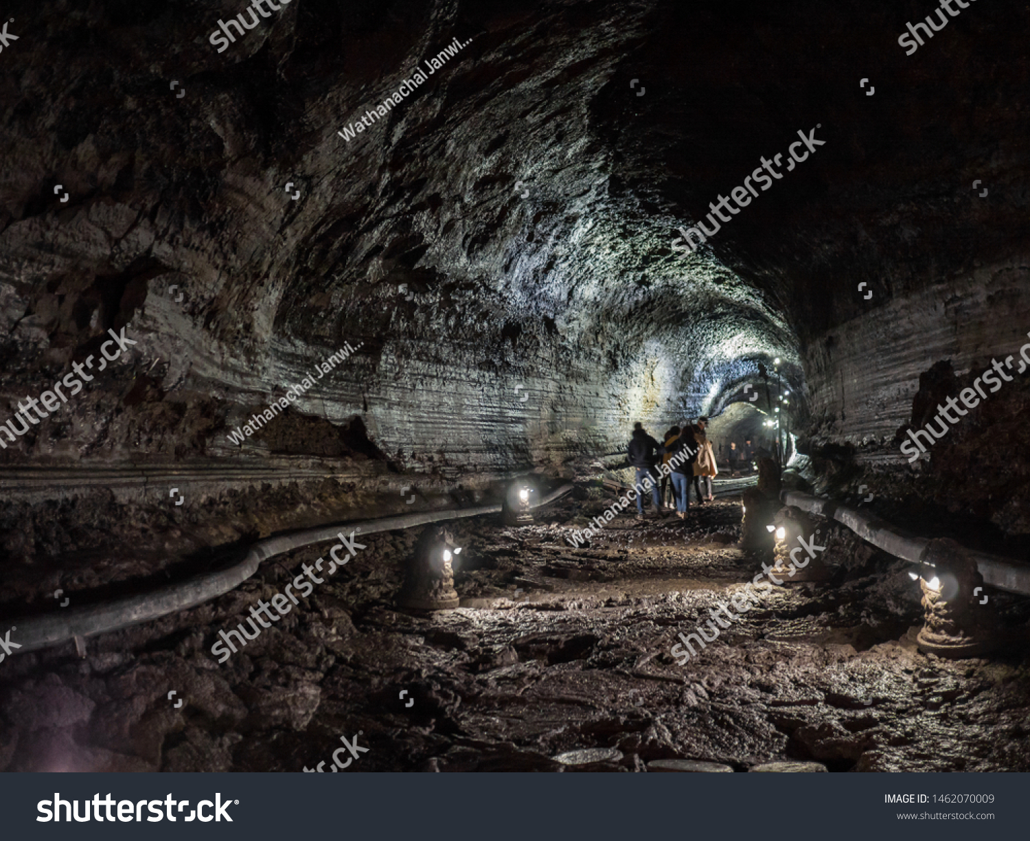 The corridor inside the Manjanggul cave with lights to watch the flow of lava flows.  At Jeju Island, South Korea. #1462070009