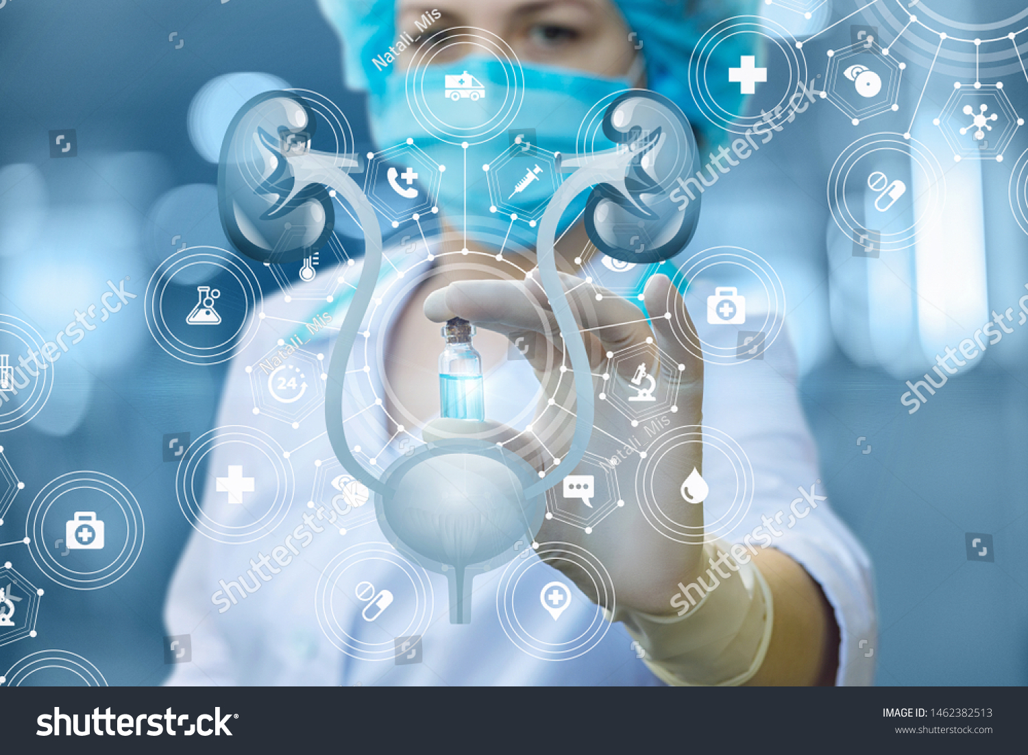 Doctor showing a cure for the treatment of urinary system on blurred background. #1462382513
