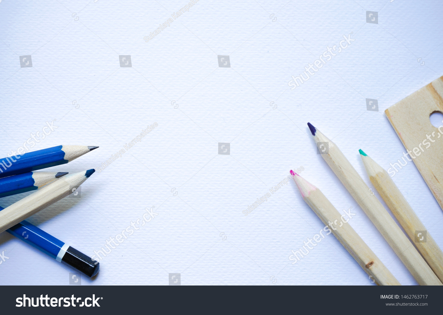 2B pencils and wooden colored pencils with ruler on white water color canvas background #1462763717