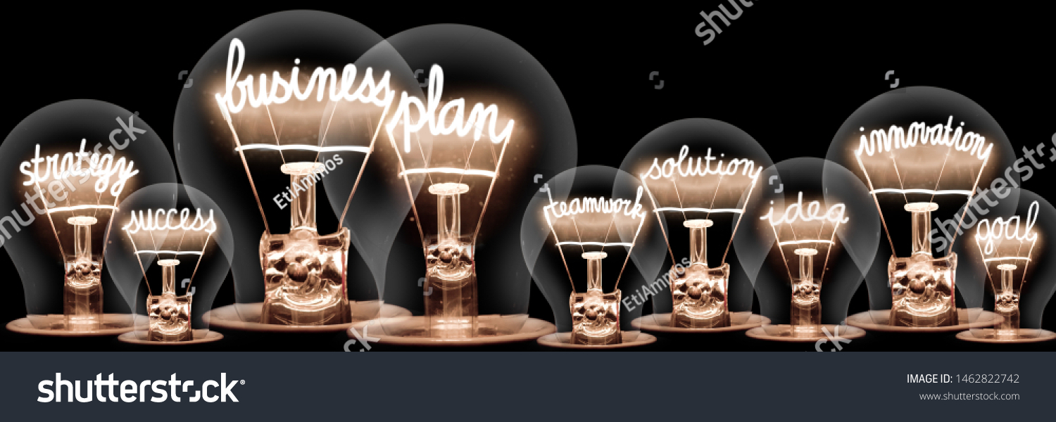 Large group of light bulbs with shining fibers in a shape of Business Plan, Strategy, Innovation and Success concept related words isolated on black background #1462822742