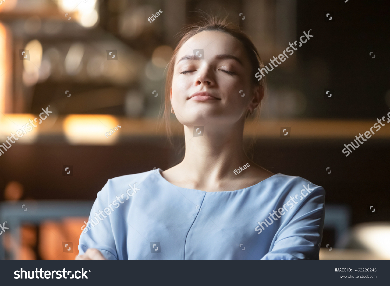 Close up of peaceful young woman relax lean back sitting with eyes closed dreaming or visualizing, happy calm female dreamer rest meditating controlling emotions. Stress free, mindfulness concept #1463226245