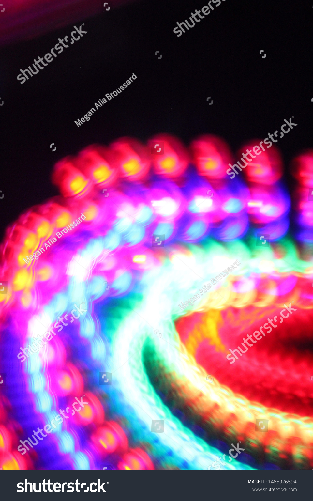 Abstract spinning rainbow colored led lights #1465976594