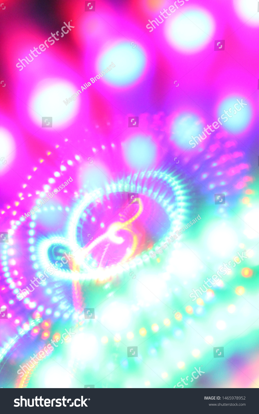 Led light blur abstract colorful rainbow background. Music symbol treble clef drawn using light in middle. #1465978952