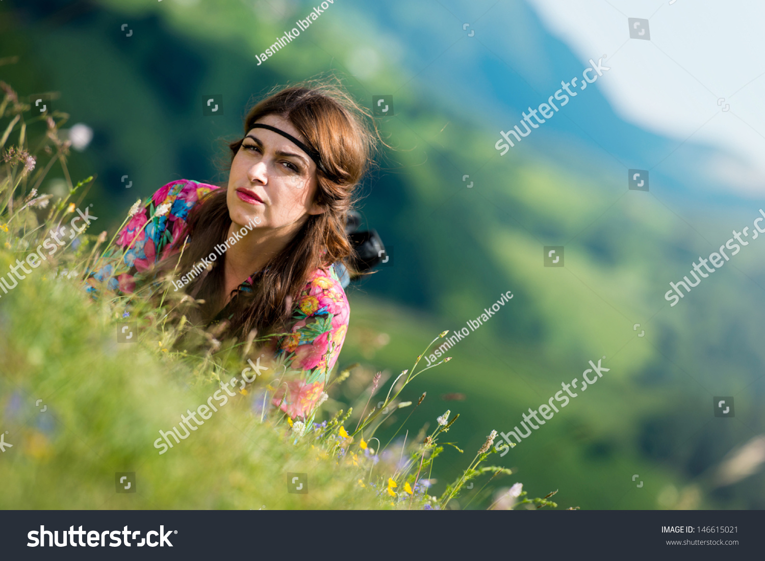 beautiful woman lying on the grass #146615021