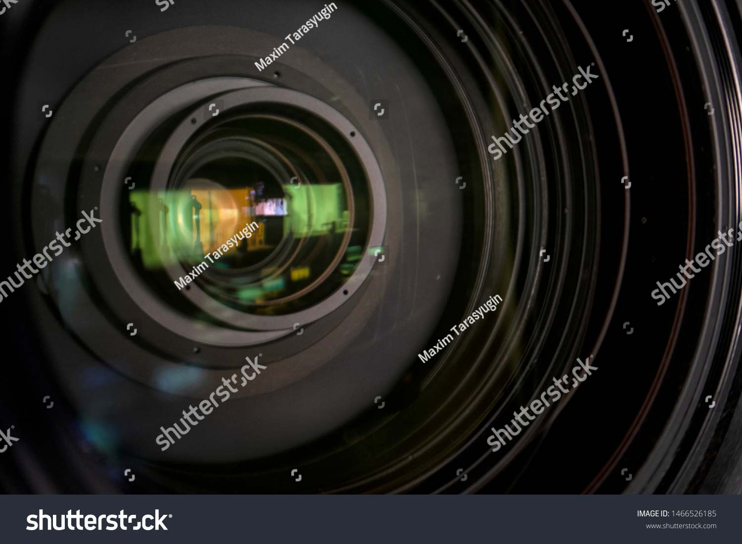 close up of a television lens  on a dark background.
Camera lens,Macro of an iris,Camera - Photographic Equipment, Lens - Optical Instrument, Circle, Metal, Single Object. #1466526185
