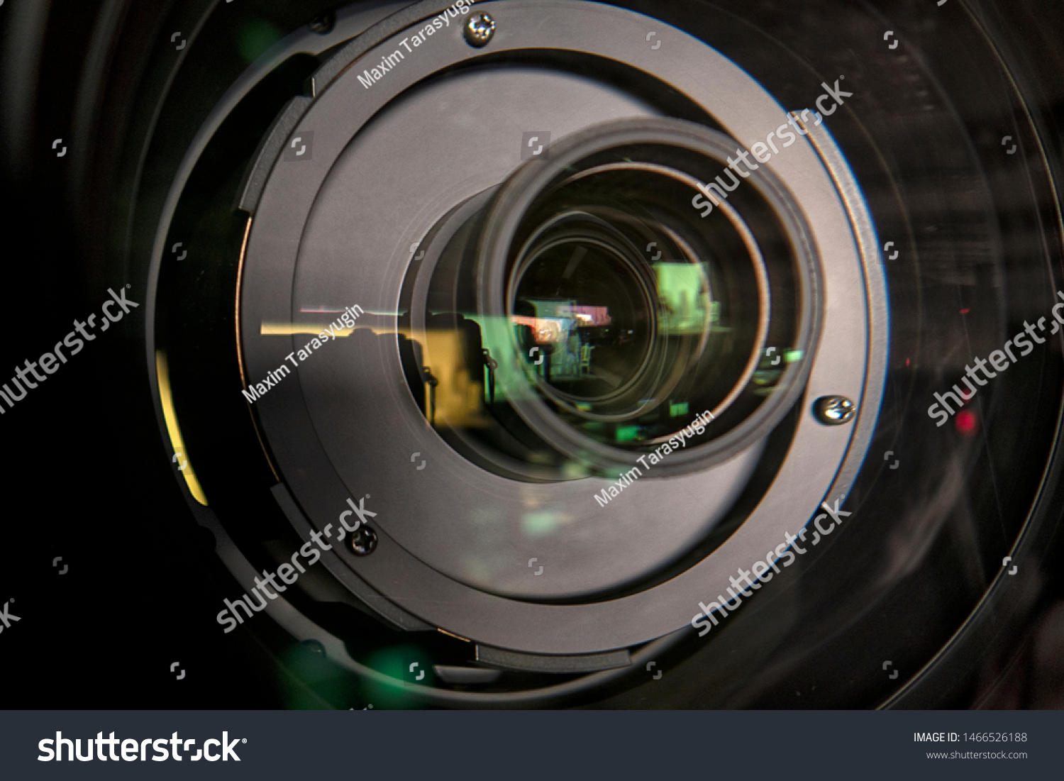 close up of a television lens  on a dark background.
Camera lens,Macro of an iris,Camera - Photographic Equipment, Lens - Optical Instrument, Circle, Metal, Single Object. #1466526188