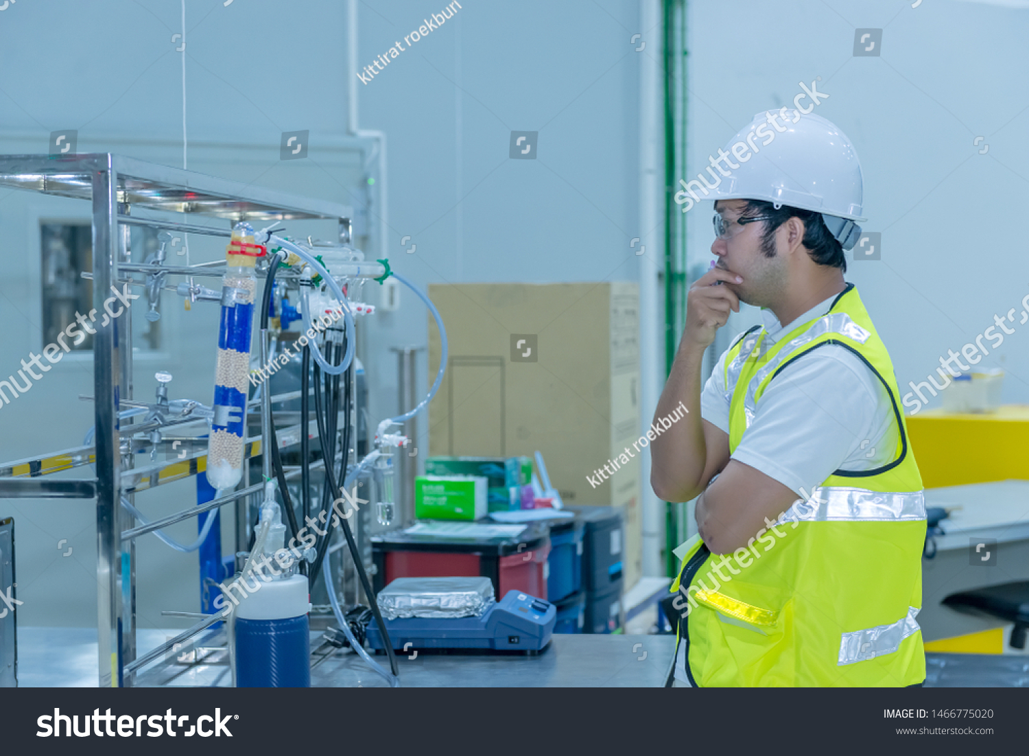 Asian engineer working at Operating hall,Thailand people wear helmet  work,He worked with diligence and patience #1466775020