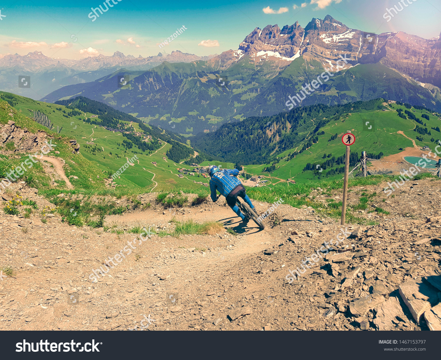 Mountain bike downhill rider on downhill trail #1467153797