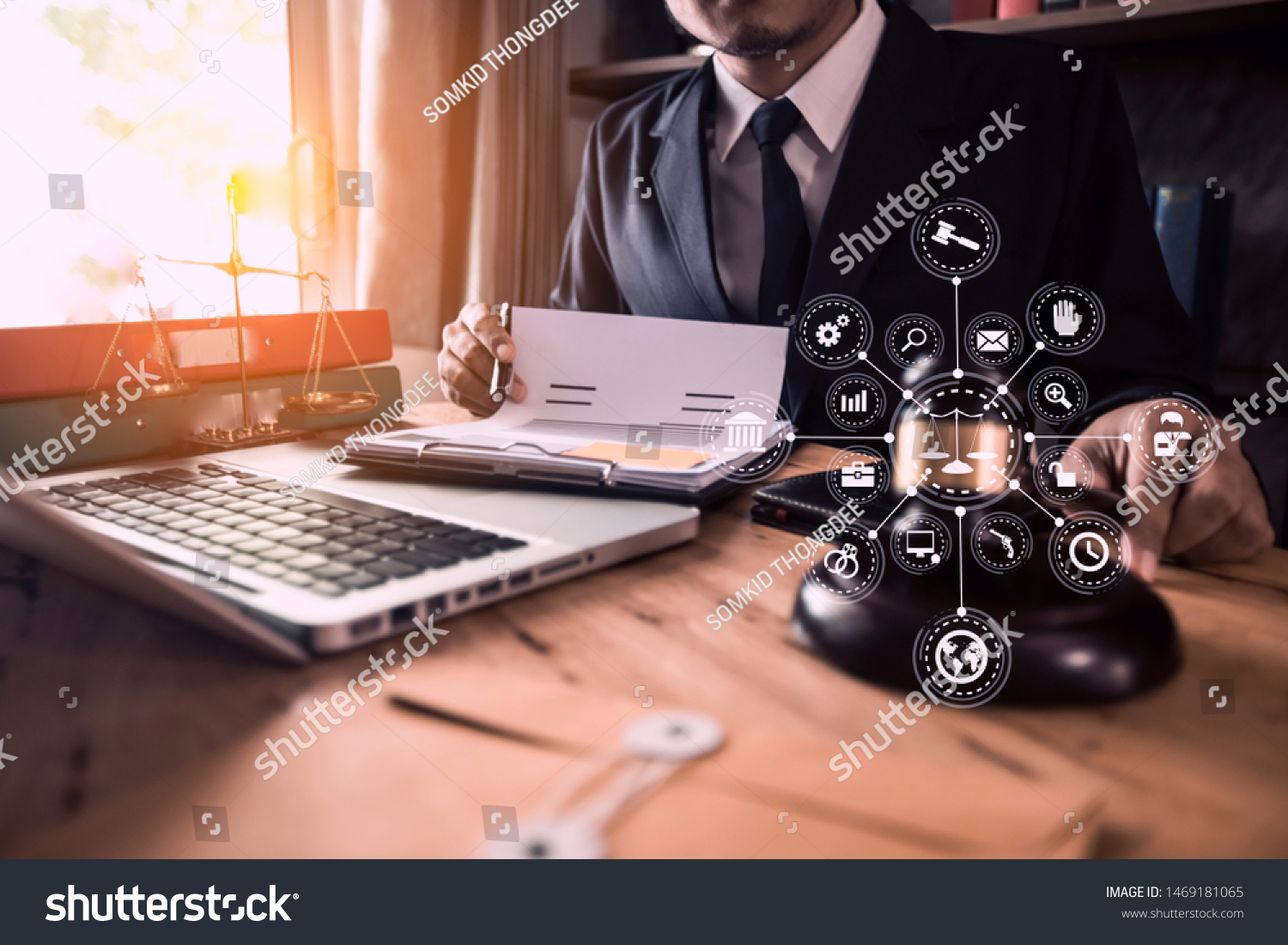 Lawyer holding the envelope and working on wood table at coffee with law interfaces icon. #1469181065