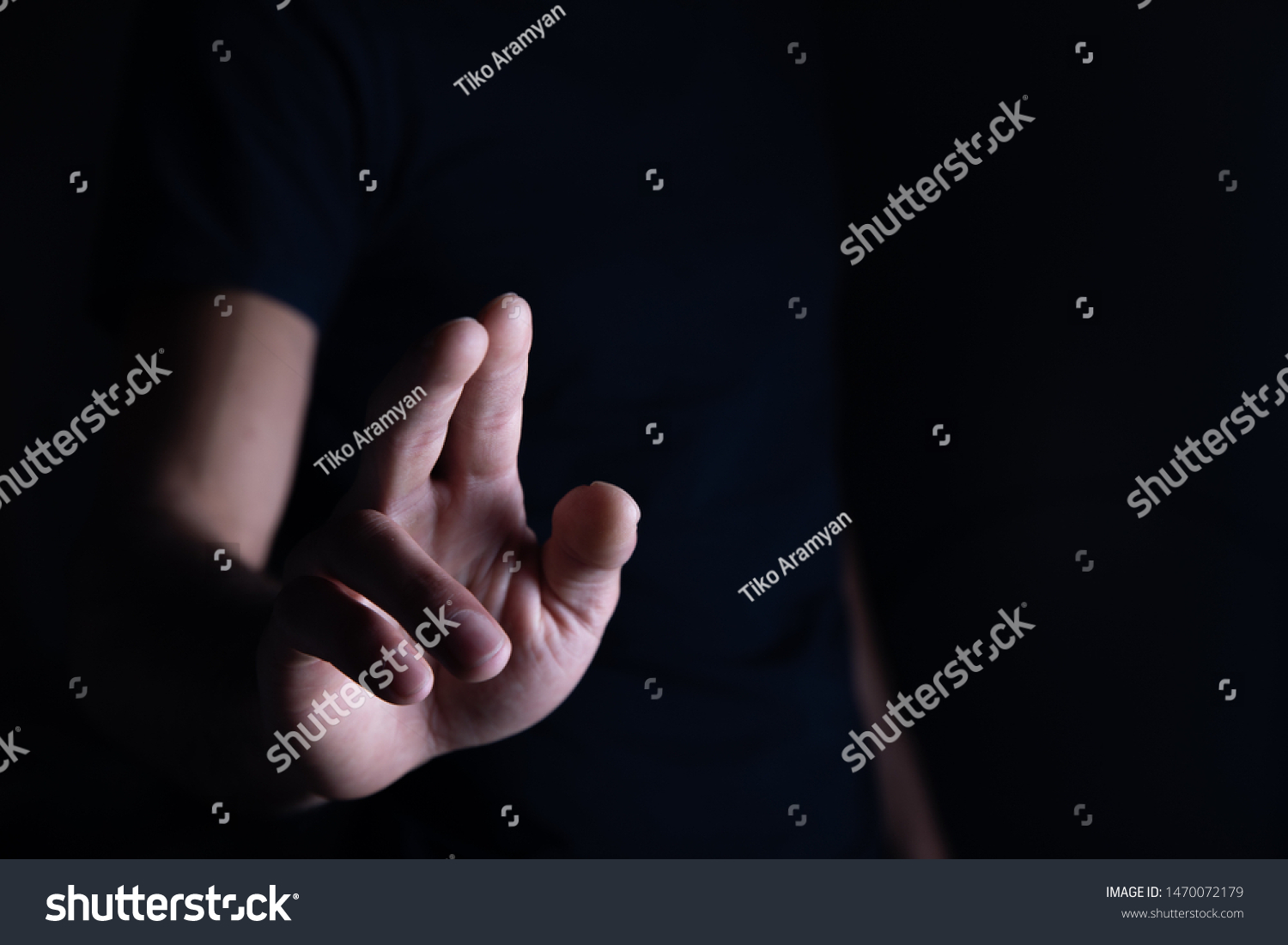 man empty palm on dark background #1470072179