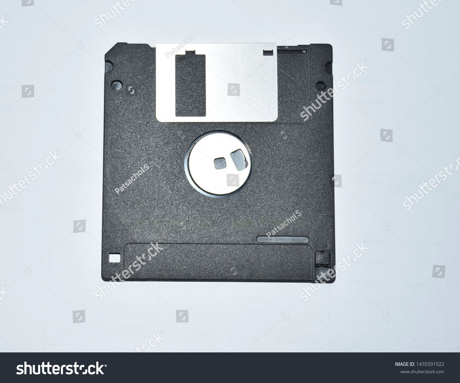 Old black square floppy disks, isolated on a white background. #1470391922