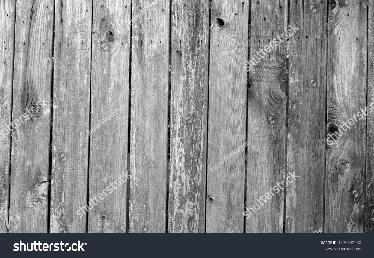 Weathered wooden fence in black and white. Abstract background and texture for design. #1470532250