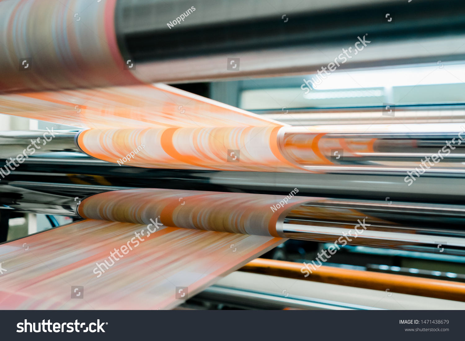 Rotogravure Printing method. It is one of flexible packaging process. Plan film was printed each color thru cylinder. Machine is running in high speed mode. This system is suitable for repeated work. #1471438679