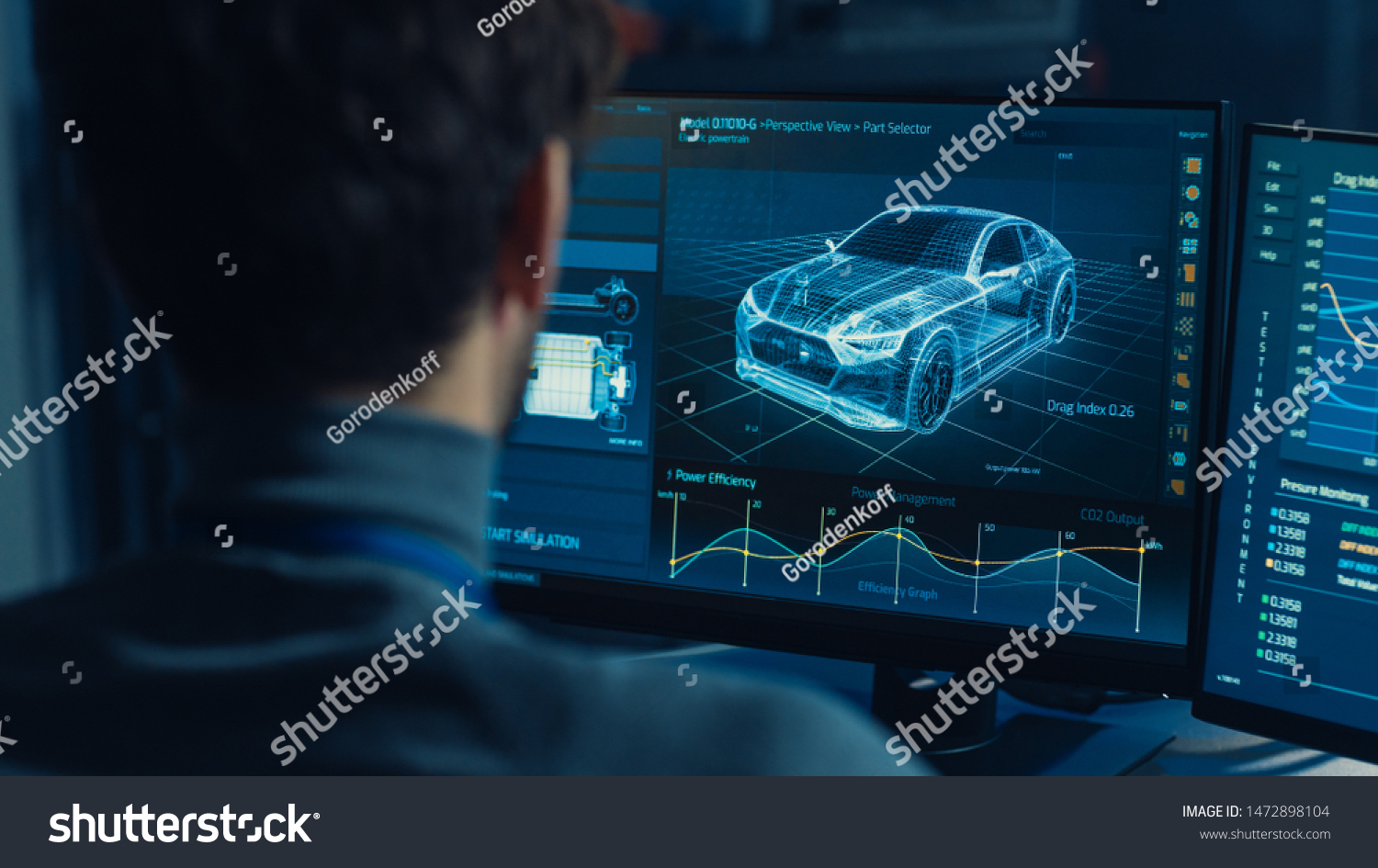 Professional Automotive Graphic Designer is Working on 3D CAD Software Rendering Electric Concept Car and Calculating its Efficiency in a High Tech Innovative Laboratory with a Prototype. #1472898104