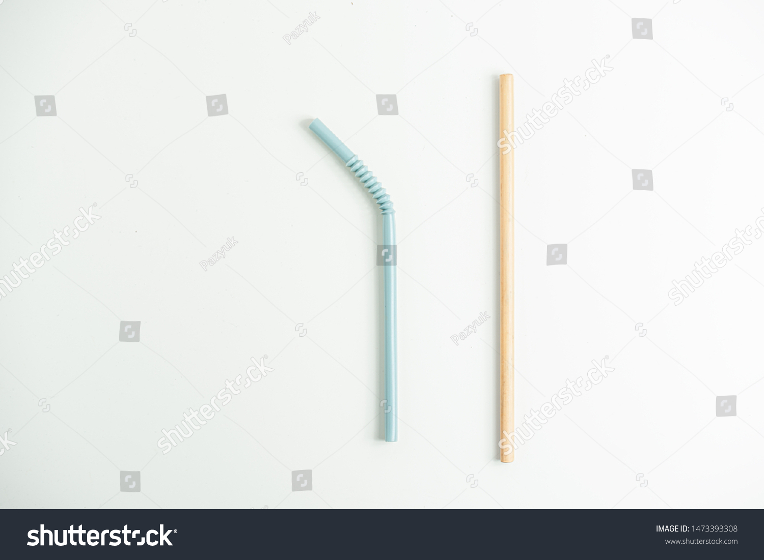 The choice between plastic and bamboo straws. Plastic and bamboo straws are isolated on a white background. Stop using plastic straws in favor of bamboo. Biodegradable straws from reeds. #1473393308
