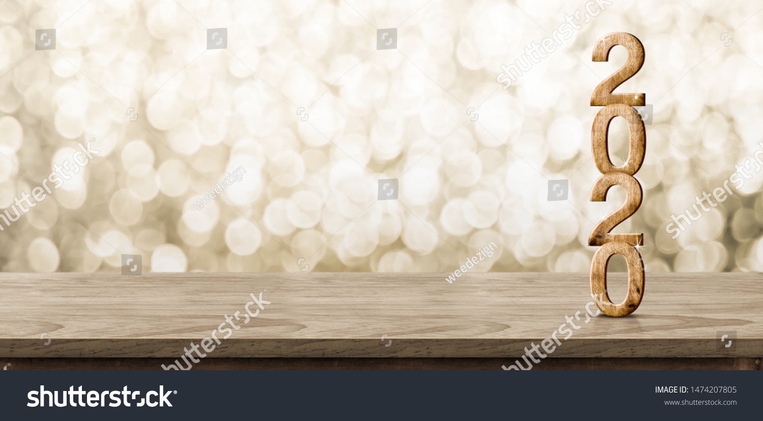 Happy New Year 2020 wood with sparkling star on brown wood table with gold bokeh background,Holiday festive celebration concept.Banner mock up for display of product or design content #1474207805