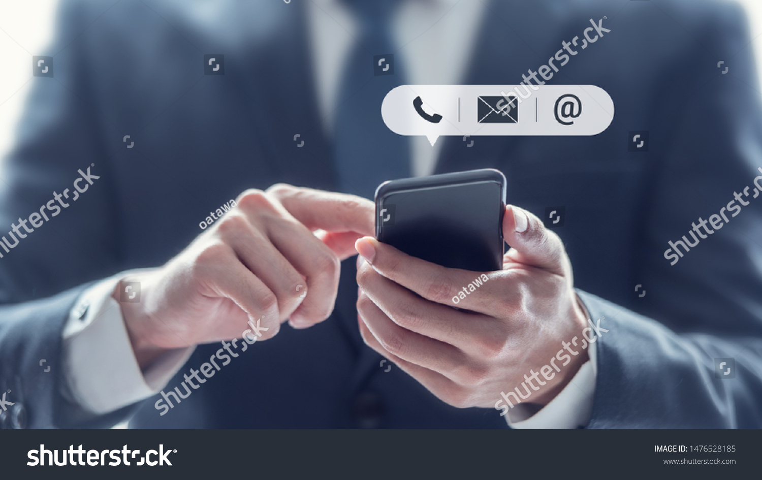 CONTACT US, Hand of Businessman holding mobile smartphone with ( mail,phone,email ) icon. customer support concept, copy space. #1476528185