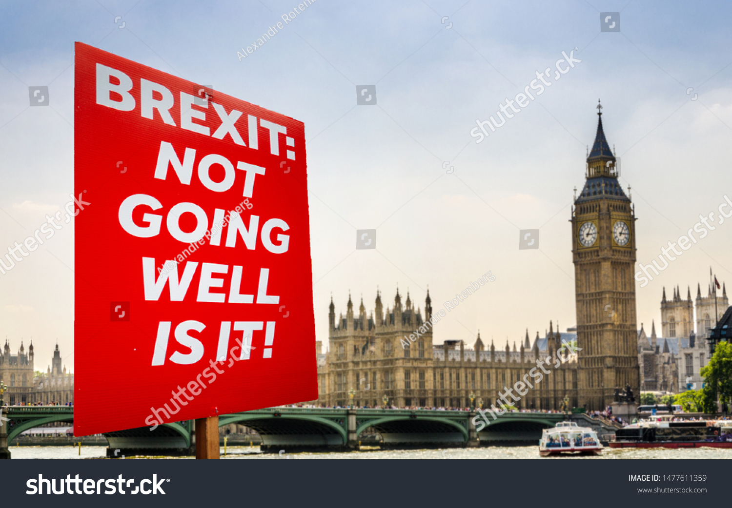 Placard with anti-Brexit message with Big Ben and Houses of Parliament, London in background #1477611359