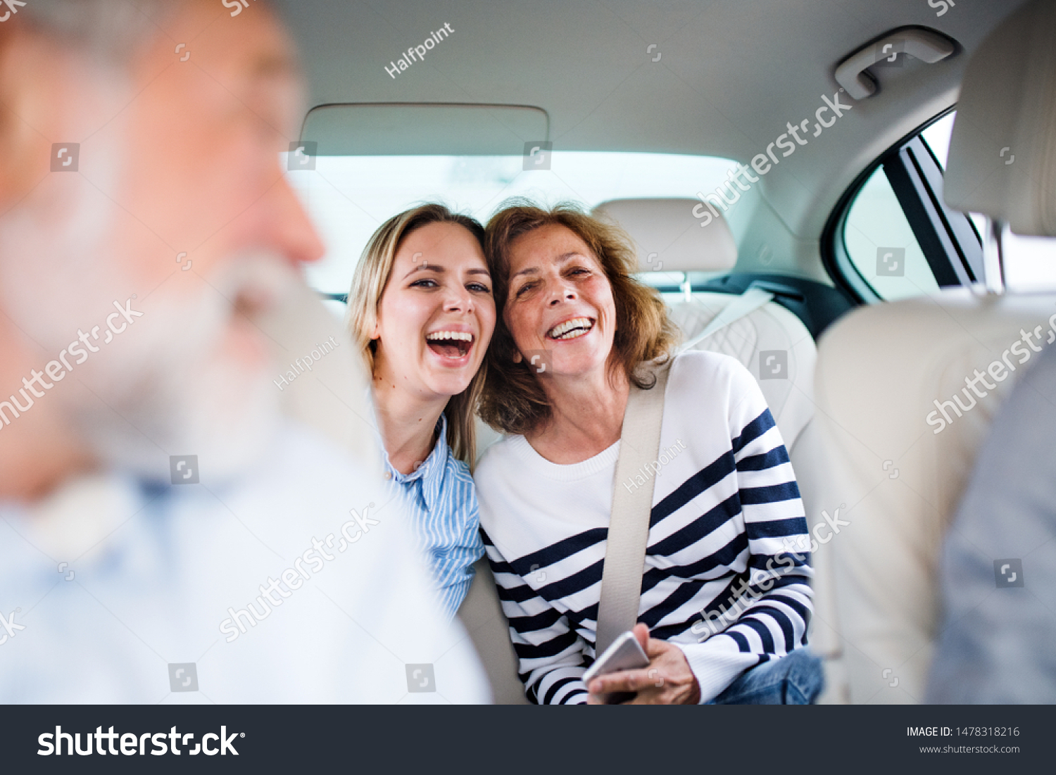 Cheerful adults sitting in car, going on a trip. #1478318216